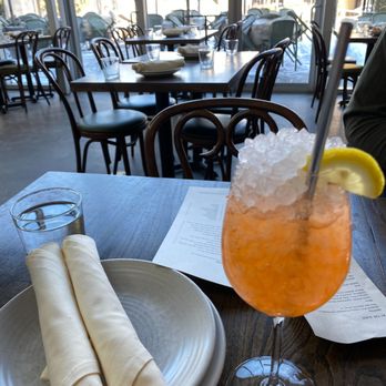 Rosalia Pizza Linden Hills - Lilikoi Spritz at the table - Pizza Near Me - Minneapolis, Minnesota