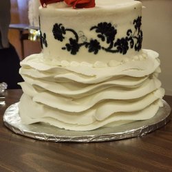 Koffee Kup Bakery - Was supposed to have one row of curtain thing down the side and flower petals on the sides.
