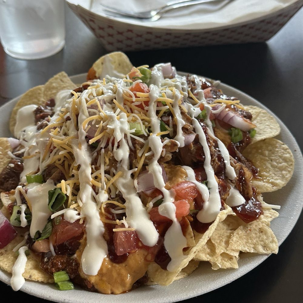 Four Pegs - BBQ Beer Cheese Nachos - Burgers Near Me - Louisville, Kentucky Four Pegs - BBQ Beer Cheese Nachos - Burgers Near Me - Louisville, Kentucky