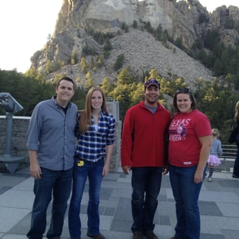 GeoFunTrek Tours - Family at Mt Rushmore.  Just one of the stops on our tour - Tours Near Me - Keystone, South Dakota