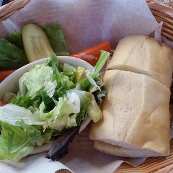 Nepenthe - The famous ambrosiaburger with a tossed green salad. - New American Near Me - Big Sur, California Nepenthe - The famous ambrosiaburger with a tossed green salad. - New American Near Me - Big Sur, California