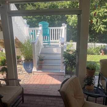 Stuart's Contracting - Entry with 62" sliding accordion screen door - General Contractors Near Me