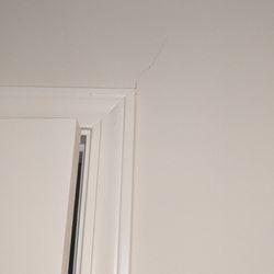 America's Home Place - Knoxville, TN - Cracks in drywall from the floor or walls moving.