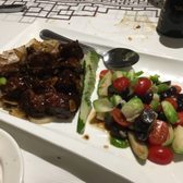 Photo of Ping's Seafood - New York, NY, United States. Sirloin Steak Cubed and Seared in Ping's Fusion Sauce ($30.95) - YUM