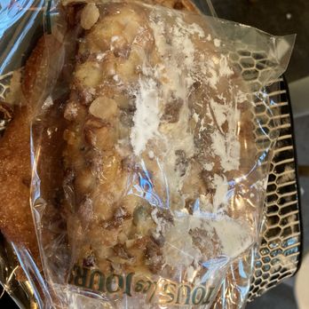 Tous Les Jours - Flat Croissant with syrup on it and baked.  It's crispy. - Coffee & Tea Near Me - Seattle, Washington