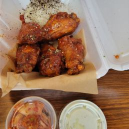 K sause wings with a side of kimchi