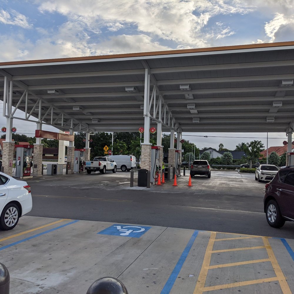 Wawa - a gas station with cars parked in the lot - Gas Stations Near Me - Miami, Florida
