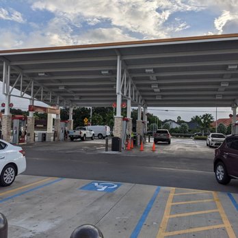 Wawa - a gas station with cars parked in the lot - Gas Stations Near Me - Miami, Florida