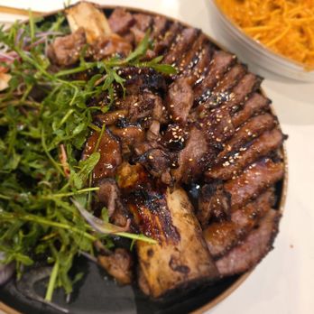 dPlace Steak & Pasta - OC Galbi Steak Korean. It comes with sides of kimchi, bean sprouts, and pickled jalapeños. - Steakhouses Near Me - Fullerton, California dPlace Steak & Pasta - OC Galbi Steak Korean. It comes with sides of kimchi, bean sprouts, and pickled jalapeños. - Steakhouses Near Me - Fullerton, California