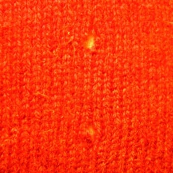 Invisible Reweaving by Toni Columbo - 2 moth holes in sweater - Sewing & Alterations Near Me - Boston, Massachusetts Invisible Reweaving by Toni Columbo - 2 moth holes in sweater - Sewing & Alterations Near Me - Boston, Massachusetts