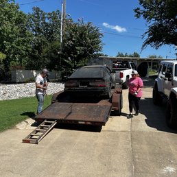 Loading car onto trailer Loading car onto trailer