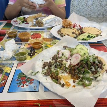 La Mama Chuy - 4 tacos 3 eaten 2 mulitas and a burrito all asada. - Food Trucks Near Me - North Hollywood, California