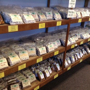 Sisters Olive & Nut Company - Shelves of all kinds of flavors of nuts. - Specialty Food Near Me - Sisters, Oregon