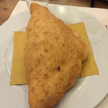 Peperino - Fried calzone. Think zeppole in terms of smell and flavor. Unfortunately, the calzone never touches their wood fired even. - Pizza Near Me - Verona, VR