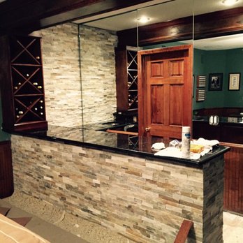 Xtreme Home Solutions - All the tile has. Even added around the new cabinets and wall - Pressure Washers Near Me - Orlando, Florida