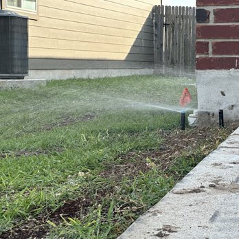 LaRaza Contracting LLC - a sprinkler spraying water on a lawn - Irrigation Near Me - Uhland, Texas LaRaza Contracting LLC - a sprinkler spraying water on a lawn - Irrigation Near Me - Uhland, Texas