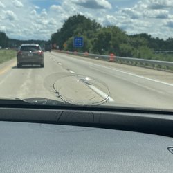 Lawrence Glass Company - Windshield damage from truck's loose gravel