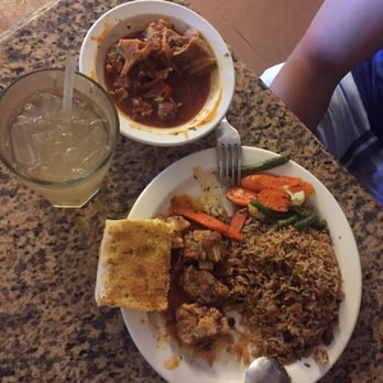 Mo's Restaurant - Oxtail and half and half drink. - Haitian Near Me - Key West, Florida