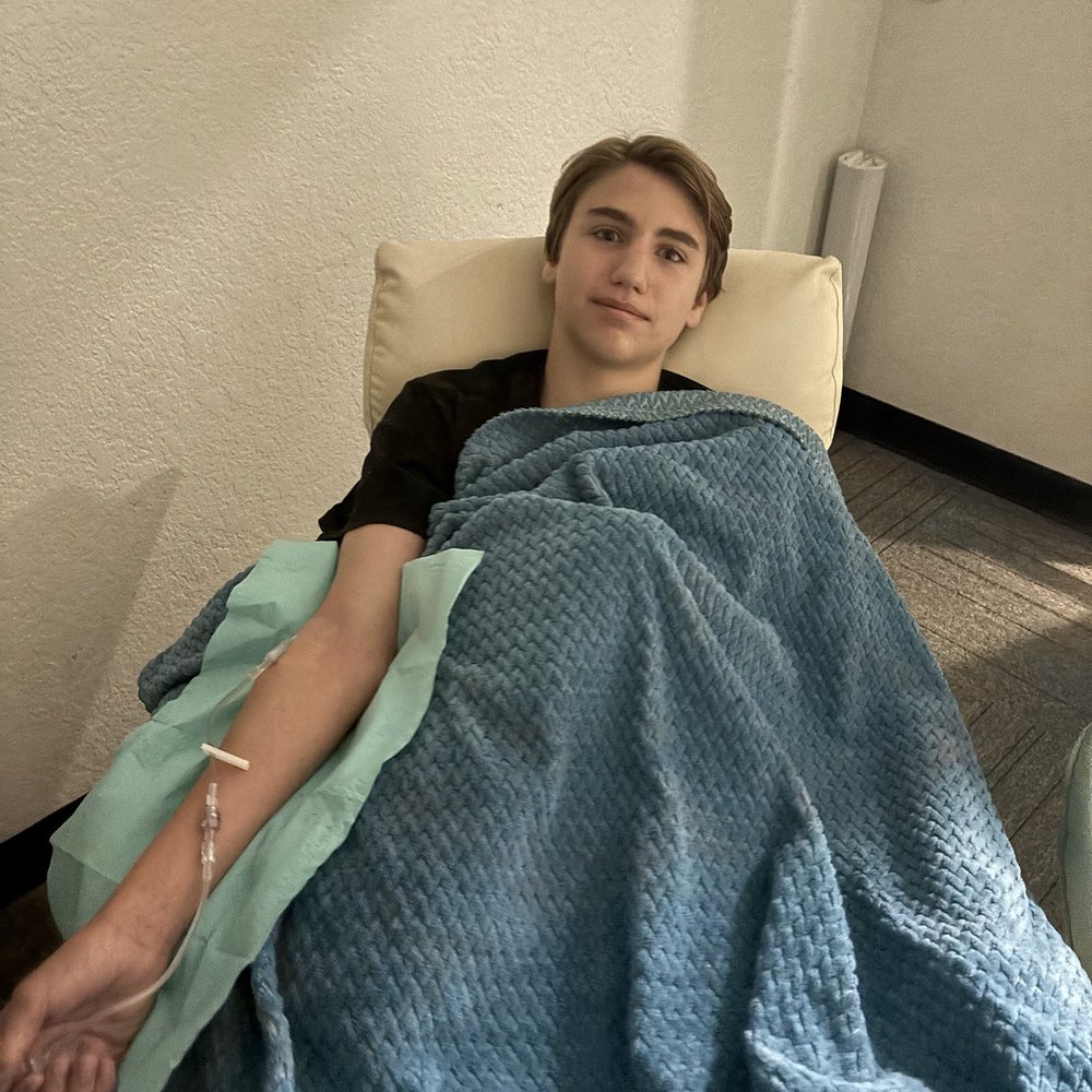 Our teen son getting rehydrated after a week-long battle with stomach flu. Our teen son getting rehydrated after a week-long battle with stomach flu.