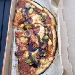 Half 11 inch pizza lunch special. Comes with a small Drink