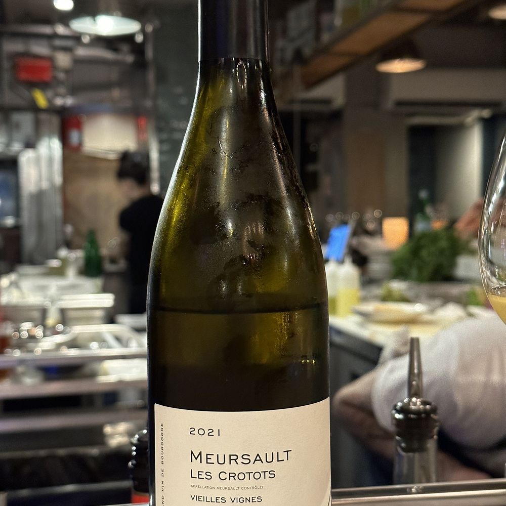 Shmoné - a bottle of wine and a glass of wine - Mediterranean Near Me - New York, New York