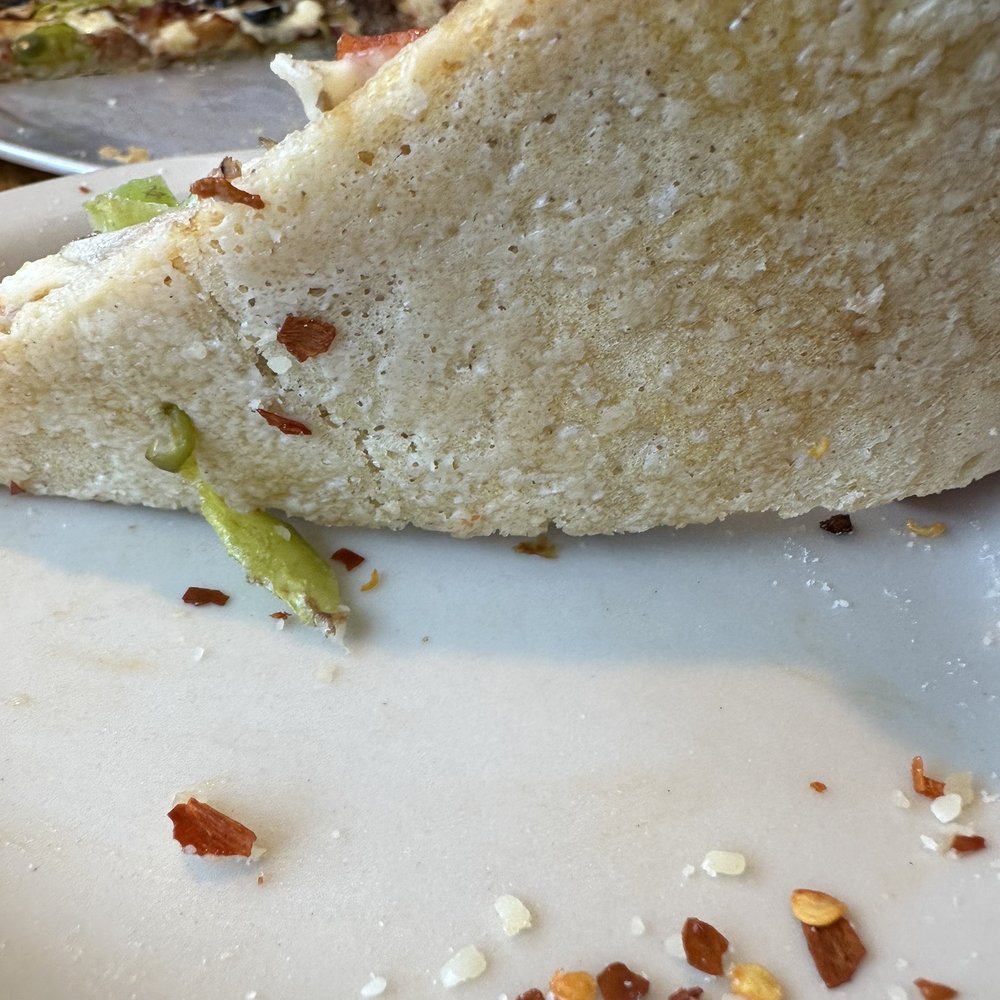 The Cloverleaf - Uncooked pizza uncooked bottom - Pizza Near Me - Tacoma, Washington