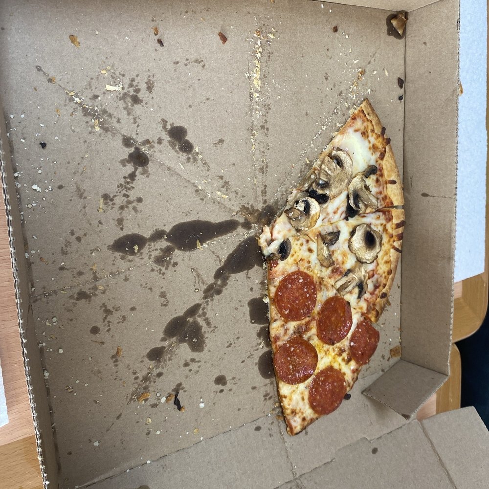 This was a Medium, thin crust with half pepperoni and half mushroom. Delicious! This was a Medium, thin crust with half pepperoni and half mushroom. Delicious!