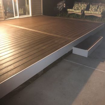 Two Shores Innovations - a wooden deck with benches - General Contractors Near Me Two Shores Innovations - a wooden deck with benches - General Contractors Near Me