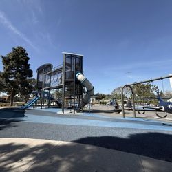 Lion's Park - Zip line, swings, climbing structures and slides.