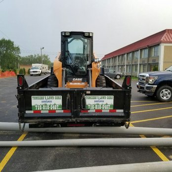 Tomczak's Lawn Care - the back end of a forklift - Landscaping Near Me Tomczak's Lawn Care - the back end of a forklift - Landscaping Near Me