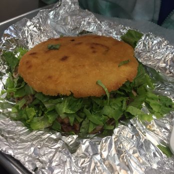 Patacon Pisao - Fried arepa with pork - Venezuelan Near Me - Elmhurst, New York Patacon Pisao - Fried arepa with pork - Venezuelan Near Me - Elmhurst, New York