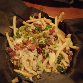 Smoque N' Bones - Southern Poutine with house cured bacon, creamy white cheese sauce and jalapeño-secial dish of the weekend - Barbeque Near Me - Toronto, Ontario Smoque N' Bones - Southern Poutine with house cured bacon, creamy white cheese sauce and jalapeño-secial dish of the weekend - Barbeque Near Me - Toronto, Ontario