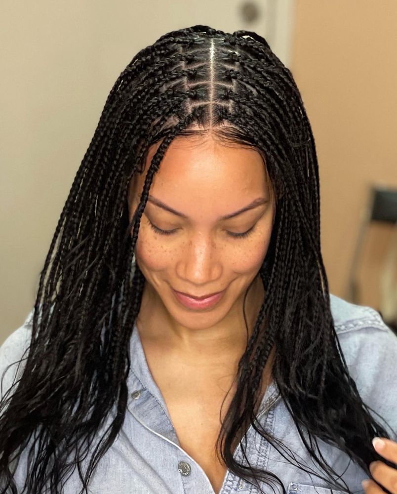 Amaka's Daughter Braiding Salon Logo