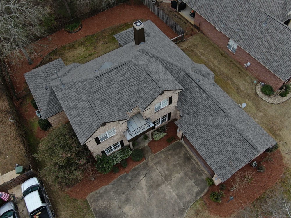 Slide of JMR Roofing