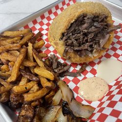 Pita Star - Pita Crunch Shawarma / Served with grilled onions, fried eggplant, french fries and sauces
