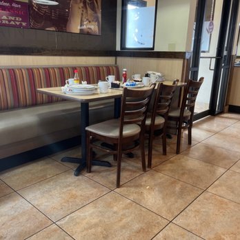 Huddle House - a table and chairs in a restaurant - American Near Me - Eagle Pass, Texas