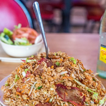Mambo Seafood - Famous Mambo Rice - Pork with habanero - Seafood Near Me - Houston, Texas Mambo Seafood - Famous Mambo Rice - Pork with habanero - Seafood Near Me - Houston, Texas
