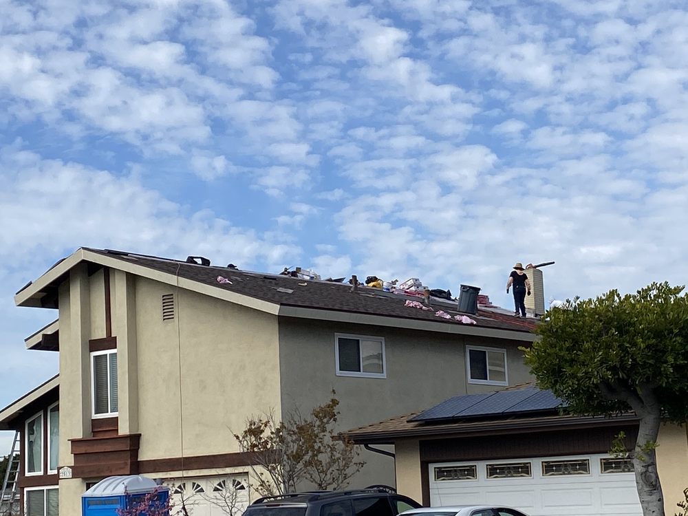 Slide of Yoshida Roofing Company