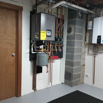 Cote Plumbing & Heating - Lochinvar Noble, Navien Tankless Water Heater - Heating & Air Conditioning/HVAC Near Me - Amesbury, Massachusetts Cote Plumbing & Heating - Lochinvar Noble, Navien Tankless Water Heater - Heating & Air Conditioning/HVAC Near Me - Amesbury, Massachusetts