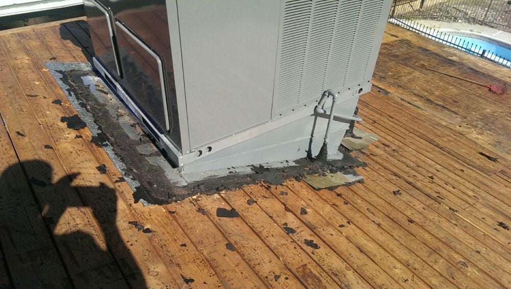 Slide of Sutton Roofing and Solar