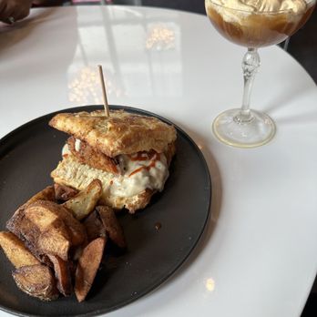 Mariposa - Smothered fried chicken biscuit and Dulce de Leche martini. - Tapas/Small Plates Near Me - Charlotte, North Carolina Mariposa - Smothered fried chicken biscuit and Dulce de Leche martini. - Tapas/Small Plates Near Me - Charlotte, North Carolina