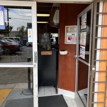 Los Molcajetes - the entrance to a restaurant - Salvadoran Near Me - Los Angeles, California Los Molcajetes - the entrance to a restaurant - Salvadoran Near Me - Los Angeles, California