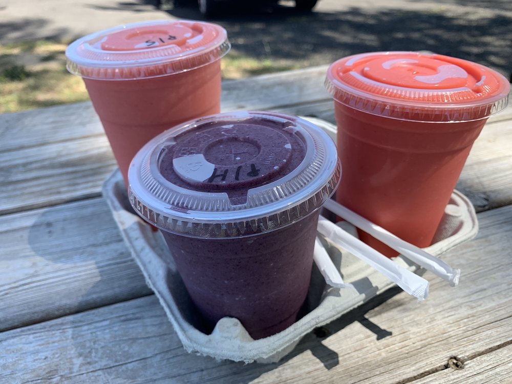 Exotic Wings And Smoothies Logo