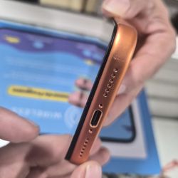 iFixandRepair - Bakersfield - A gap between the screen and the phone resulting from not closing it properly after evaluating it under warranty.
