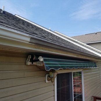 Shine Through Window Cleaning - Gutter cleaning. Left side after, right side before. - Window Washing Near Me