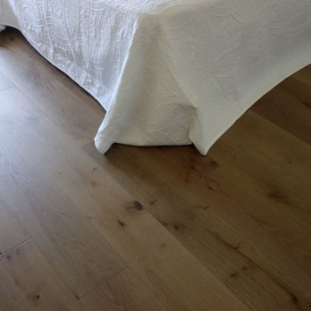 Friendly Steps Flooring - a bedroom with a bed - Flooring Near Me - Dublin, California