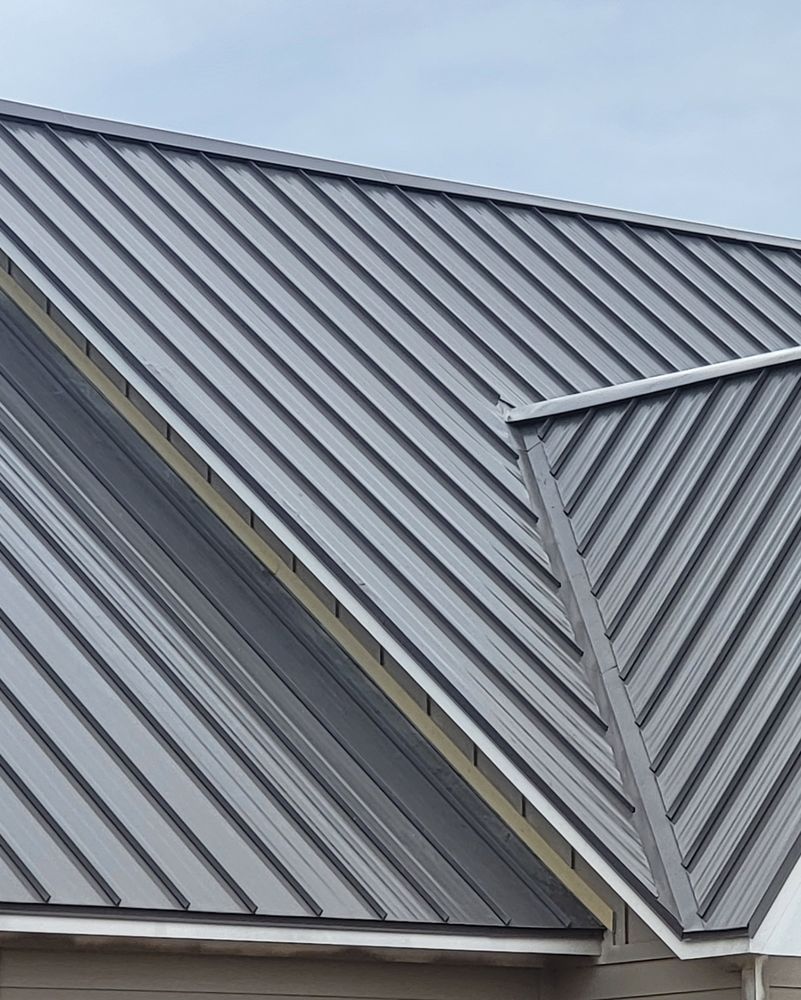 Slide of JC Custom Metal Roofing