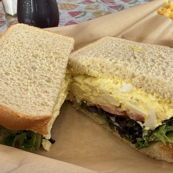 Round Bout Deli - Egg salad on white with lettuce and tomato. Delicious! - Delis Near Me - Murphy, North Carolina
