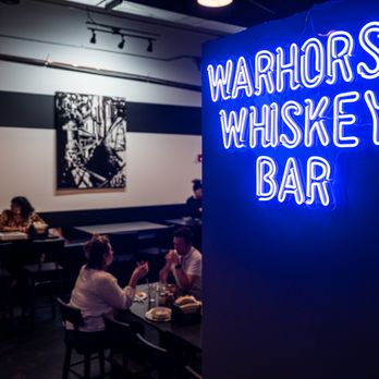 Warhorse Whiskey Bar - people sitting at tables - Bars Near Me - Tallahassee, Florida Warhorse Whiskey Bar - people sitting at tables - Bars Near Me - Tallahassee, Florida
