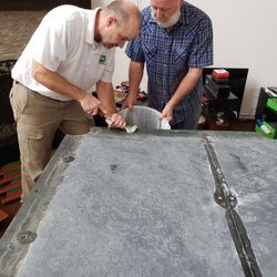 DFW Billiard Professionals - Scraping off the old glue to set the new glue for the felt